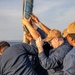 USS Normandy performs sea and anchor while pulling into Curacao