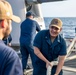 USS Normandy performs sea and anchor while pulling into Curacao