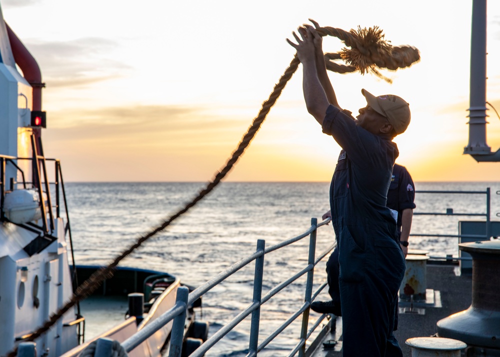 USS Normandy performs sea and anchor while pulling into Curacao