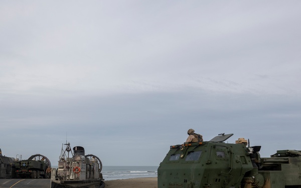 QUART 25.2: Marines and Sailors perform LCAC drills with HIMARS on Red Beach