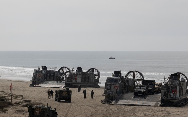 QUART 25.2: Marines and Sailors perform LCAC drills with HIMARS on Red Beach