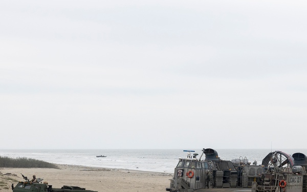 QUART 25.2: Marines and Sailors perform LCAC drills with HIMARS on Red Beach