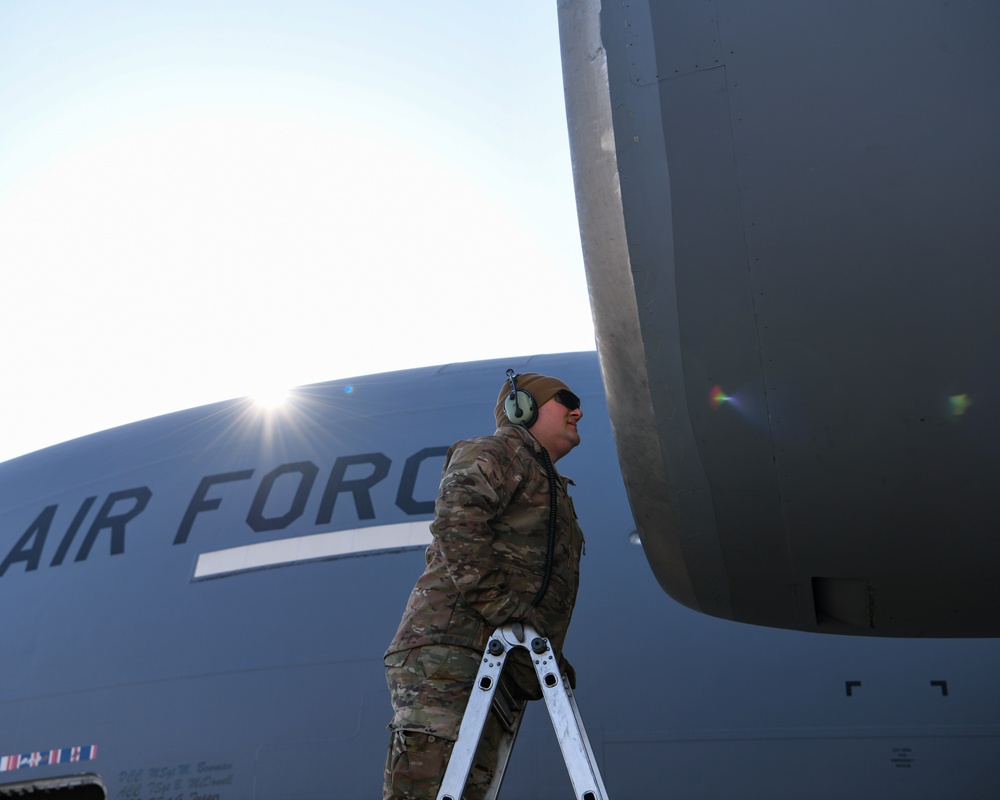 172nd Airlift Wing crew members perform pre-flight checks before departure from Springfield-Beckley Municipal Airport