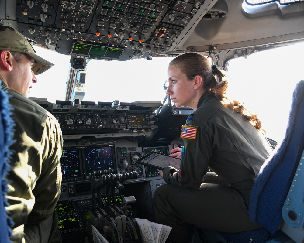 172nd Airlift Wing crew members perform pre-flight checks before departure from Springfield-Beckley Municipal Airport