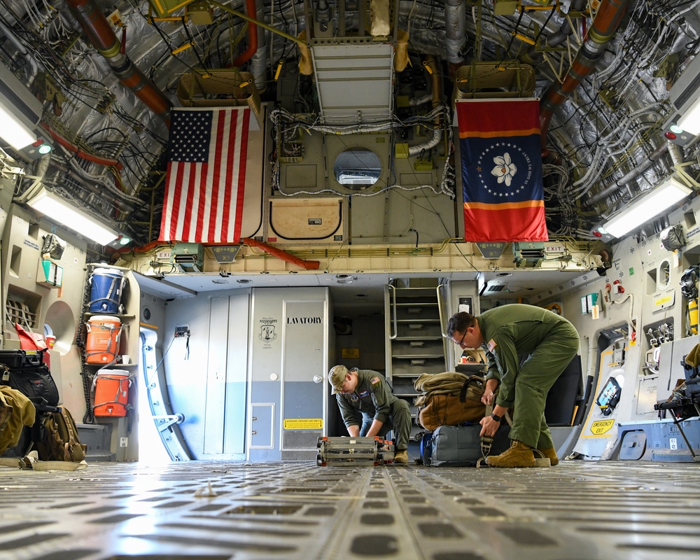 172nd Airlift Wing crew members perform pre-flight checks before departure from Springfield-Beckley Municipal Airport