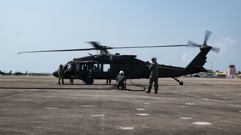 U.S. Marines perform aviation-delivered ground refueling on U.S. Army Sikorsky UH-60 Black Hawk during Cobra Gold 25