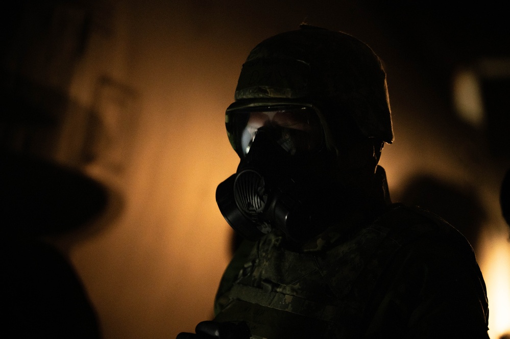 Yokota Airmen perform decontamination of aircraft, aircrew during BM 25-2
