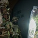 Yokota Airmen perform decontamination of aircraft, aircrew during BM 25-2