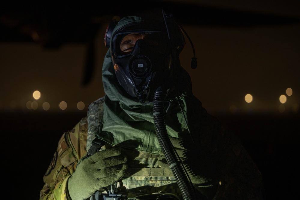 Yokota Airmen perform decontamination of aircraft, aircrew during BM 25-2