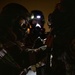 Yokota Airmen perform decontamination of aircraft, aircrew during BM 25-2