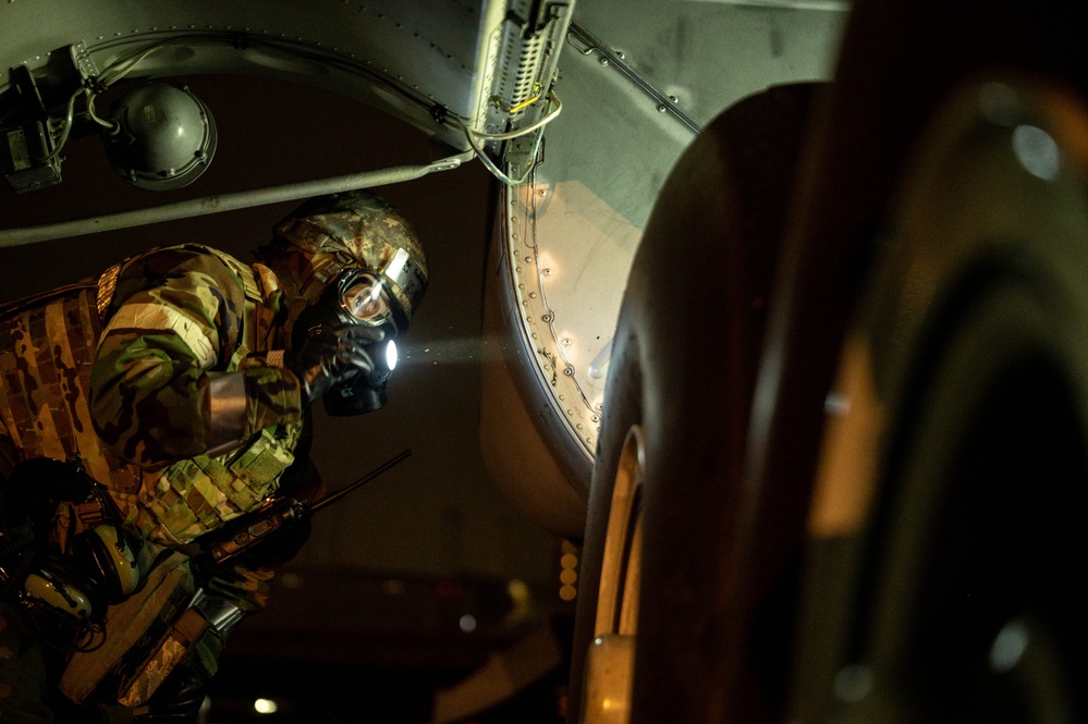 Yokota Airmen perform decontamination of aircraft, aircrew during BM 25-2