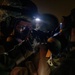Yokota Airmen perform decontamination of aircraft, aircrew during BM 25-2