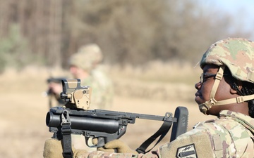 Headquarters and Headquarters Battery, 1st Battalion, 77th Field Artillery Regiment fire the M320 Grenade Launcher Module