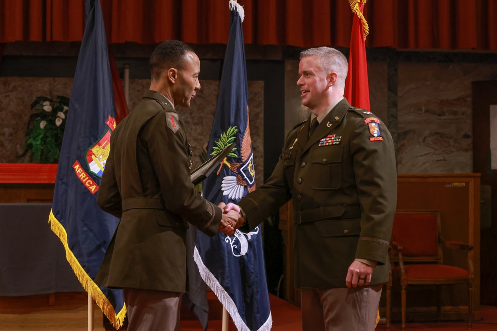 Staff advocate receives promotion in Italy