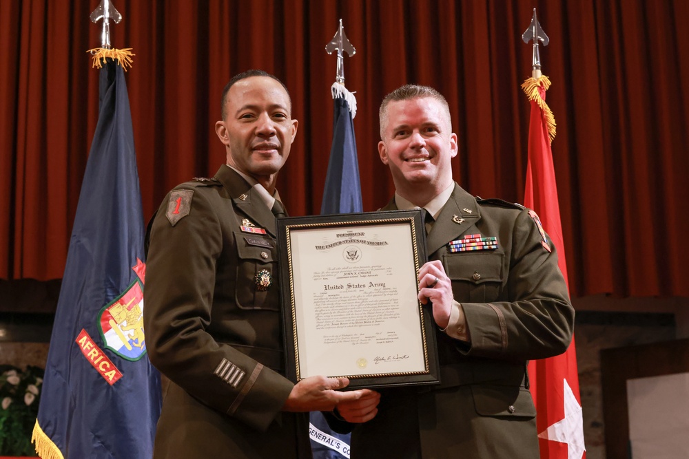 Staff advocate receives promotion in Italy