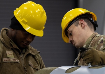 HERE COMES THE BOOM: Munitions squadron stays ready with bomb-building exercise