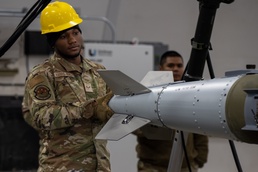 HERE COMES THE BOOM: Munitions squadron stays ready with bomb-building exercise