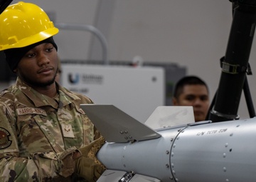 HERE COMES THE BOOM: Munitions squadron stays ready with bomb-building exercise