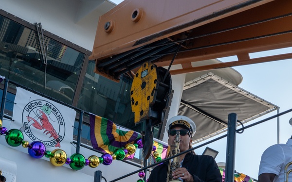 Coast Guard annual drop off of the Krewe of Zulu