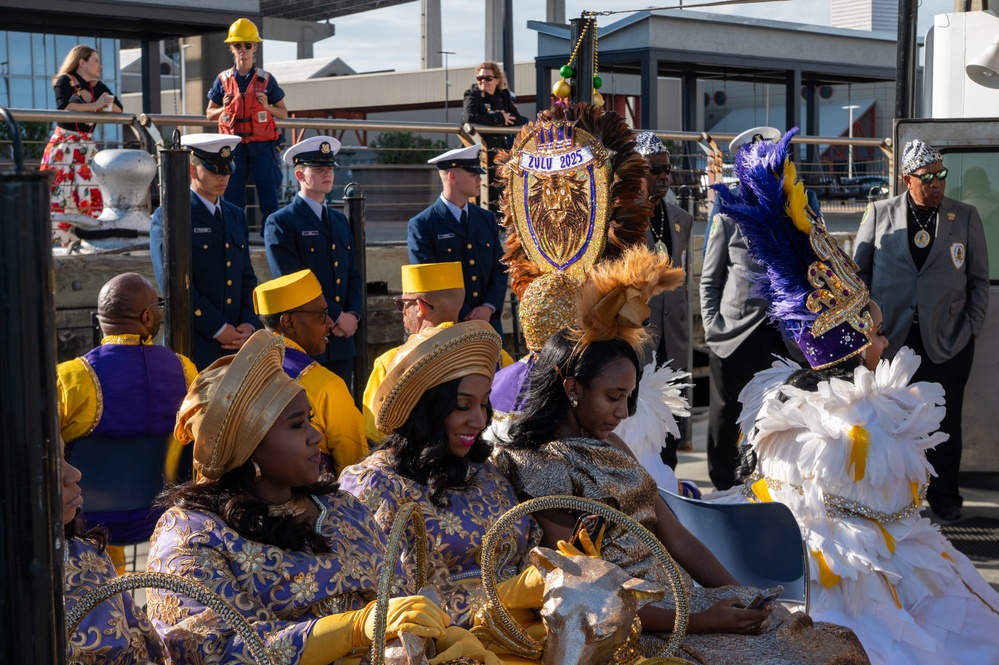 Coast Guard annual drop off of the Krewe of Zulu