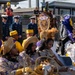 Coast Guard annual drop off of the Krewe of Zulu