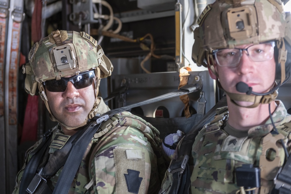 Task Force Associator Soldiers conduct sling-load training with Marines