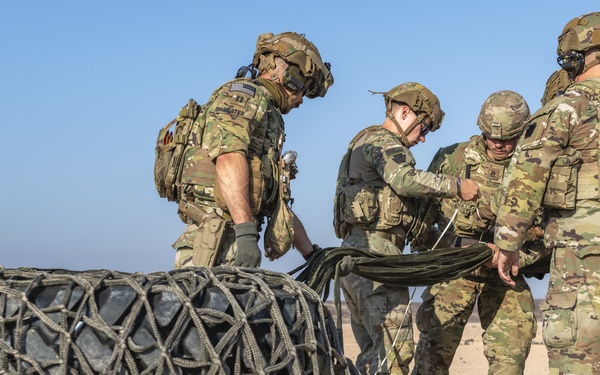 Task Force Associator Soldiers conduct sling-load training with Marines
