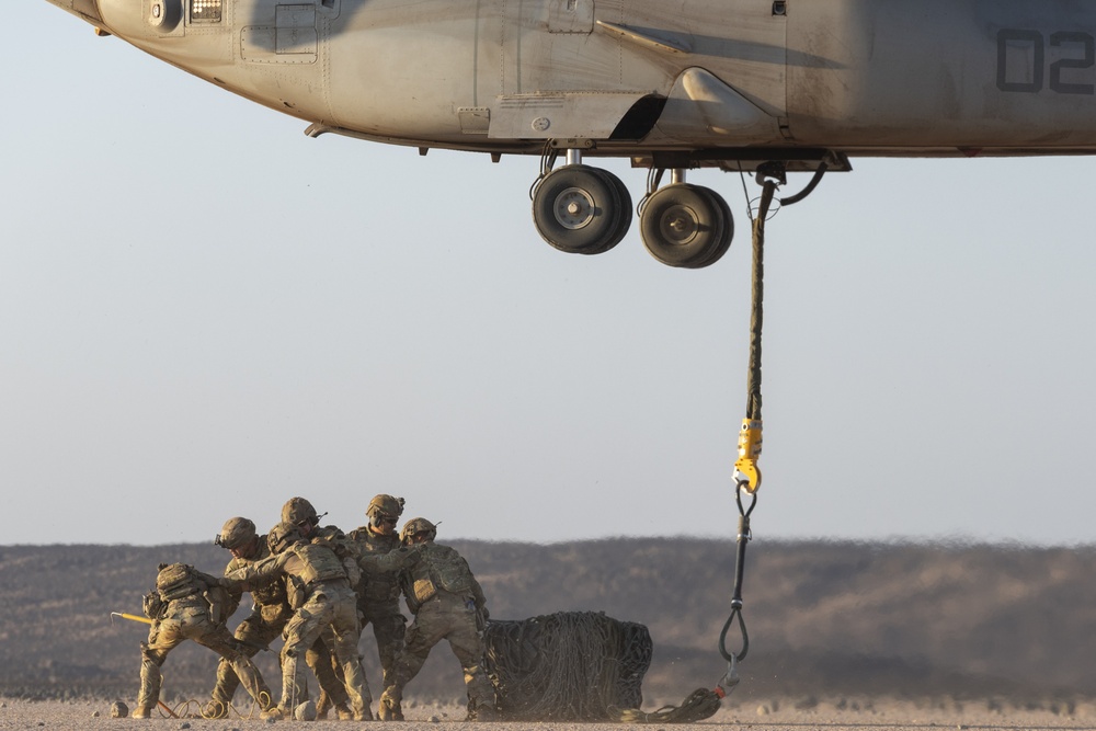 Task Force Associator Soldiers conduct sling-load training with Marines