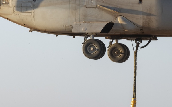 Task Force Associator Soldiers conduct sling-load training with Marines