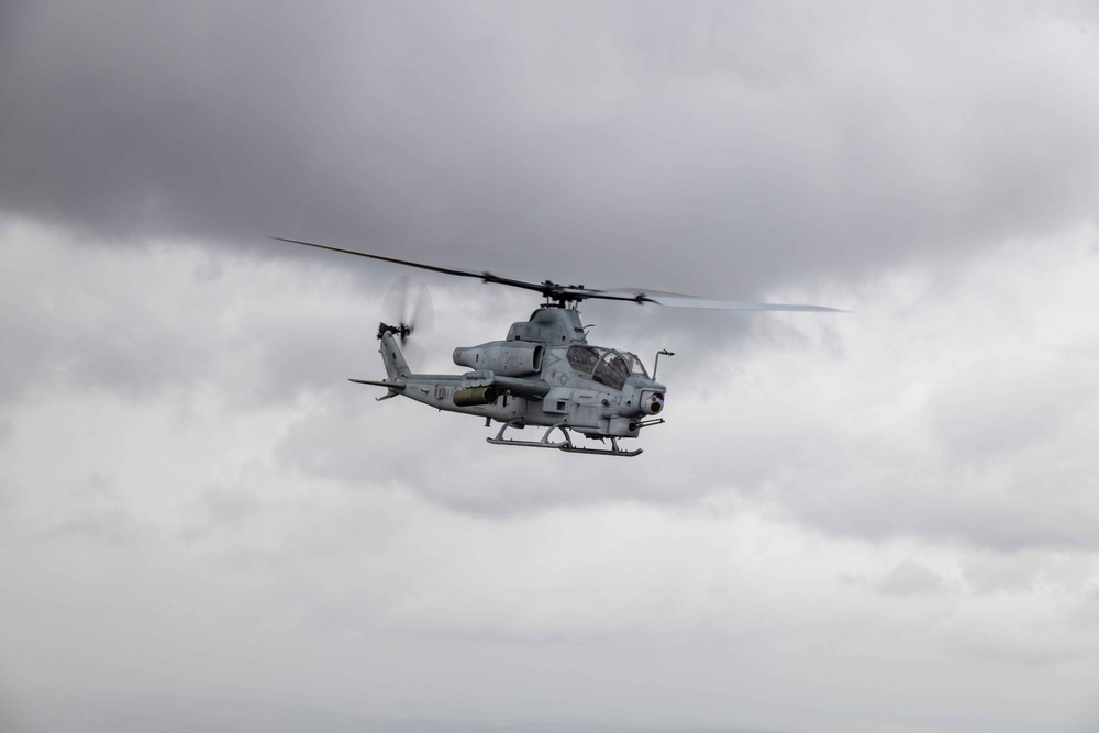 U.S. Marines with HMLA-367 fly over Miramar National Cemetery to honor veteran
