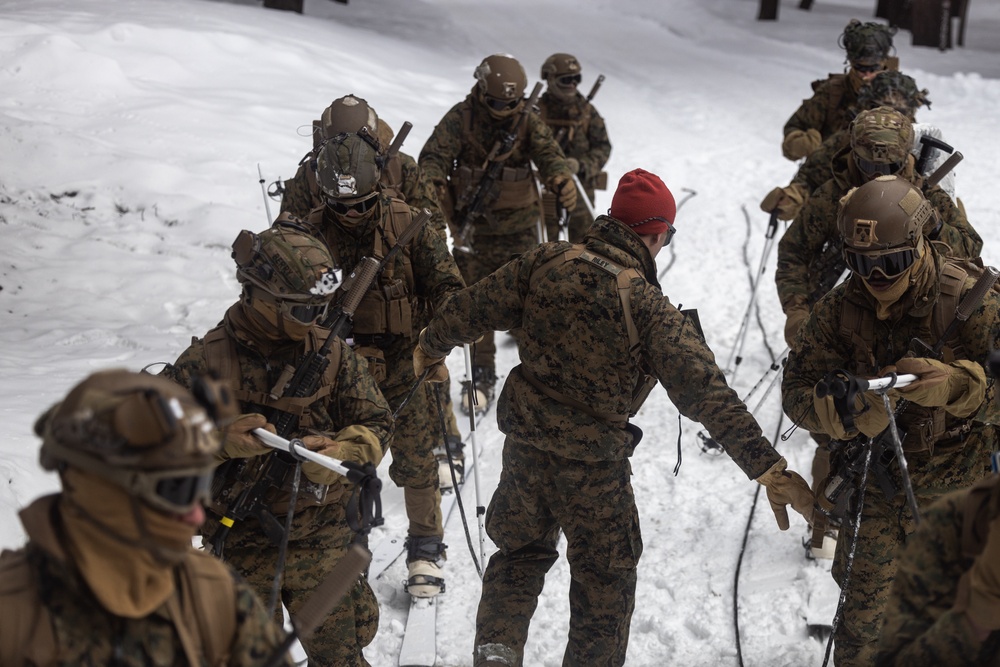 U.S. Marines with 1st Battalion, 6th Marine Regiment, 2d Marine Division ski patrol during MTX 2-25