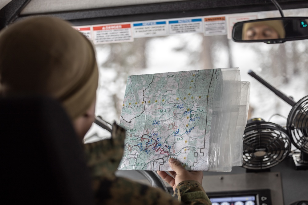 U.S. Marines with 1st Battalion, 6th Marine Regiment, 2d Marine Division ski patrol during MTX 2-25