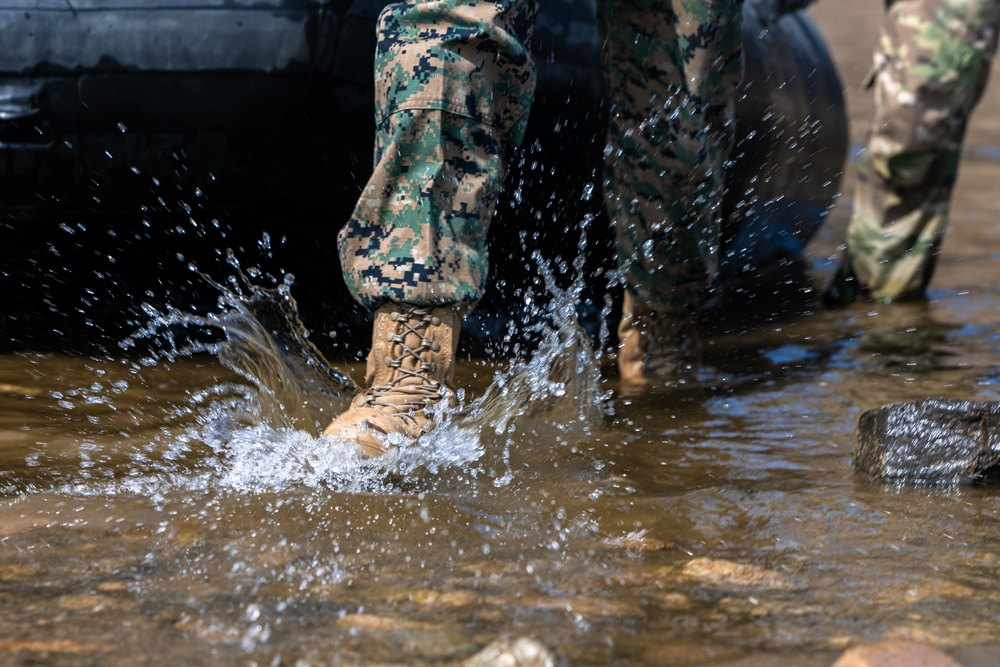 Stronger Together, U.S. Marines and U.S. Army Soldiers Move Equipment Using an Improved Ribbon Bridge