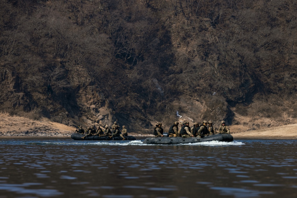 Stronger Together, U.S. Marines and U.S. Army Soldiers Move Equipment Using an Improved Ribbon Bridge