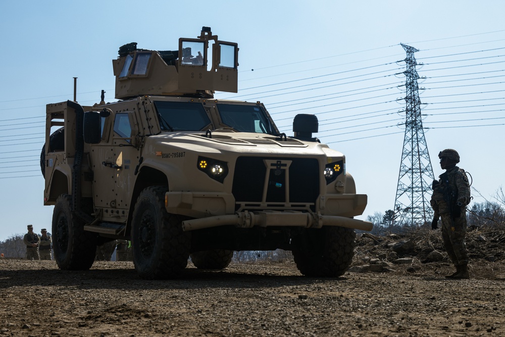 Stronger Together, U.S. Marines and U.S. Army Soldiers Move Equipment Using an Improved Ribbon Bridge