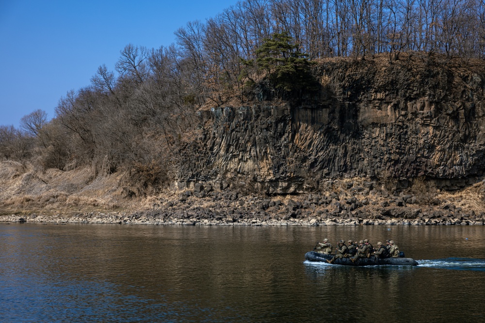 Stronger Together, U.S. Marines and U.S. Army Soldiers Move Equipment Using an Improved Ribbon Bridge