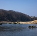 Stronger Together, U.S. Marines and U.S. Army Soldiers Move Equipment Using an Improved Ribbon Bridge