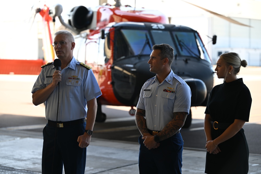 Seventh Coast Guard District commander meritoriously advances member