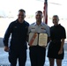 Seventh Coast Guard District commander meritoriously advances member