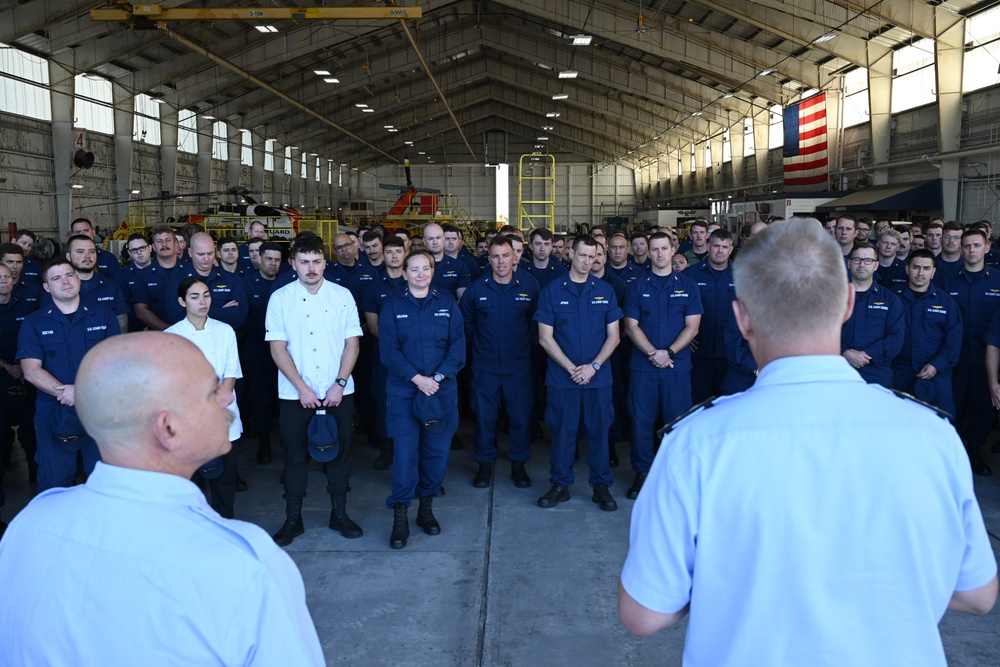 Seventh Coast Guard District commander meritoriously advances member