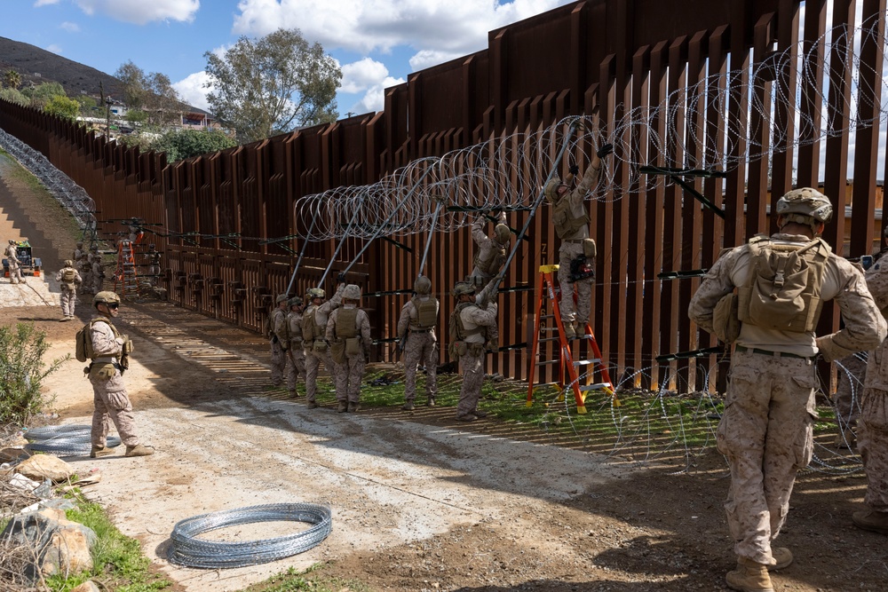 DVIDS - Images - U.S. Marines mount concertina wire along southern ...