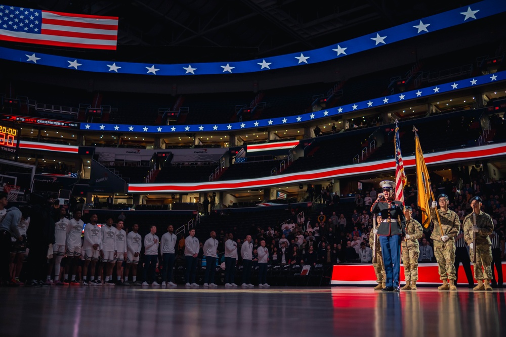 Sgt. Shelby Petersen performs the national anthem at Capital One Arena