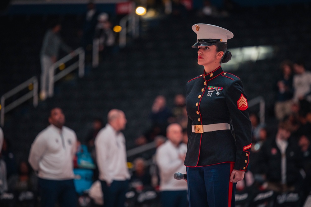 Sgt. Shelby Petersen performs the national anthem at Capital One Arena