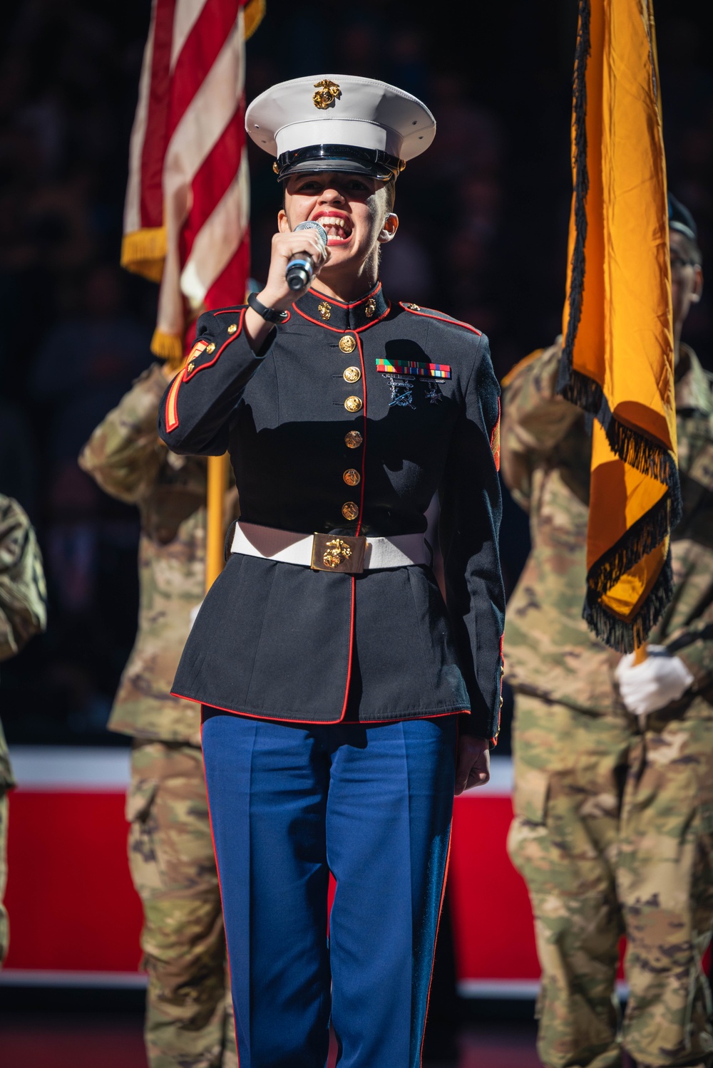 Sgt. Shelby Petersen performs the national anthem at Capital One Arena