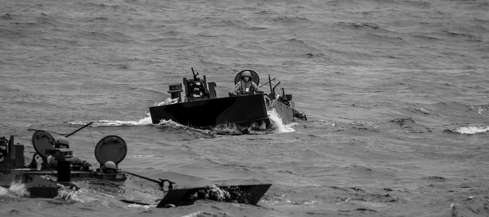 QUART 25.2: U.S. Marine Corps Amphibious Combat Vehicles embark USS Somerset.