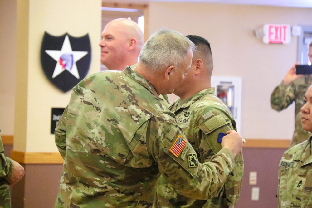 Fort McCoy Garrison Soldiers switch to 88th Readiness Division patch in patching ceremony