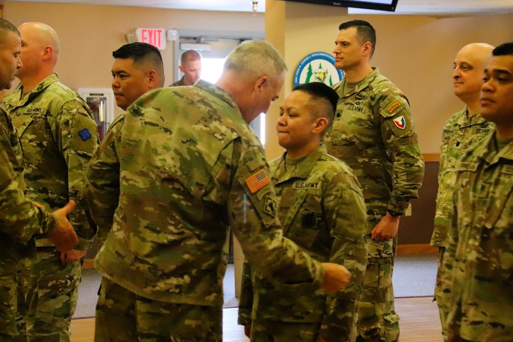 Fort McCoy Garrison Soldiers switch to 88th Readiness Division patch in patching ceremony