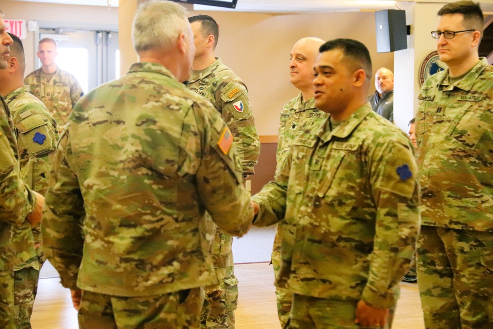 Fort McCoy Garrison Soldiers switch to 88th Readiness Division patch in patching ceremony