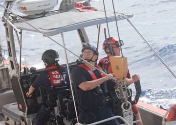 Coast Guard Cutter Reliance conducts small boat operations at sea