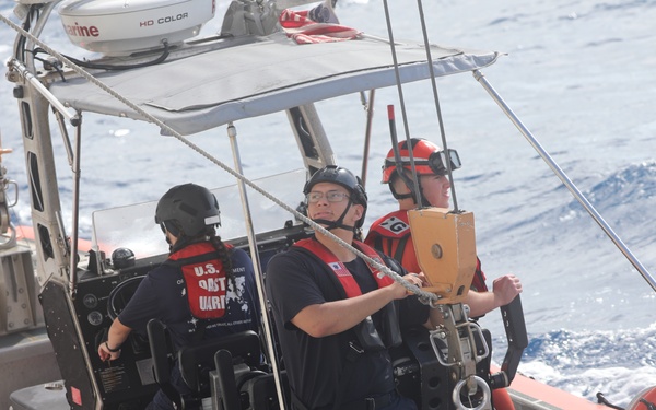Coast Guard Cutter Reliance conducts small boat operations at sea